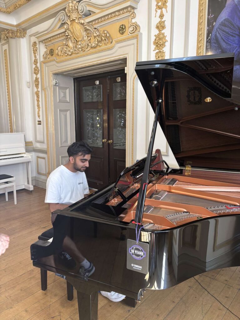 DJ9 performing live piano at an elegant venue